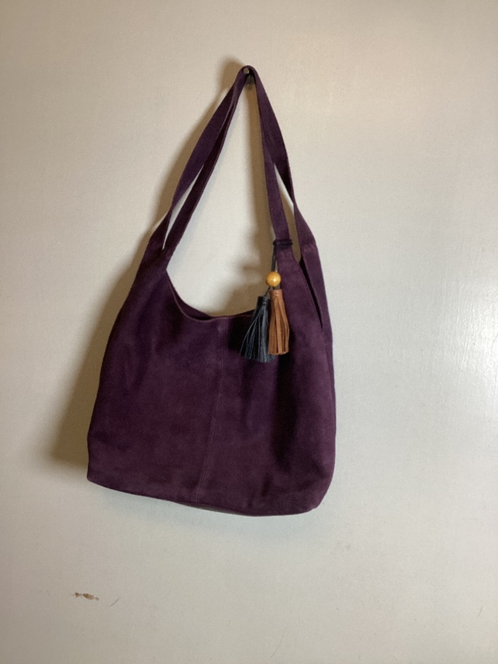 The Sak suede hobo with contrast tassels with wooden bead accent #boho # suede